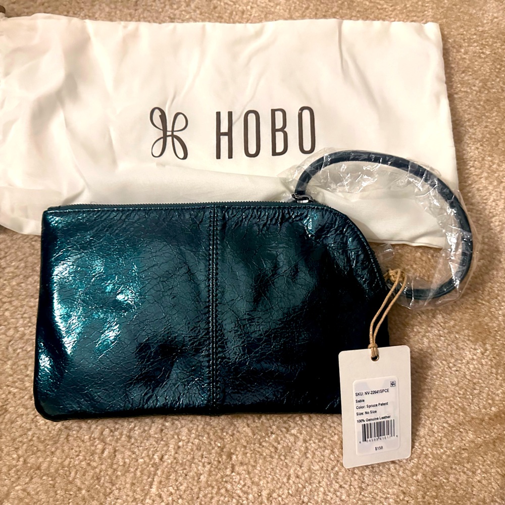 A HOBO icon and best seller, Sable Spruce Patent